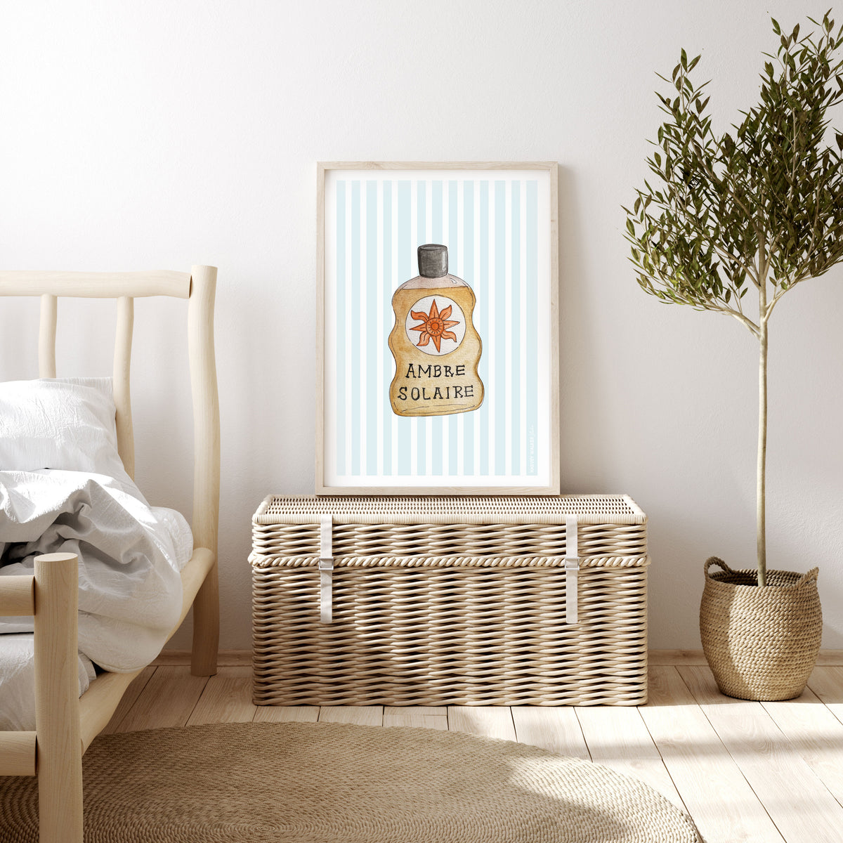 Timber framed fine art print on giclee textured paper. Image of vintage suncream bottle, ambre solaire withe blue and white stripe background. Coastal home with neutral colours, framed in timber white wash frame.