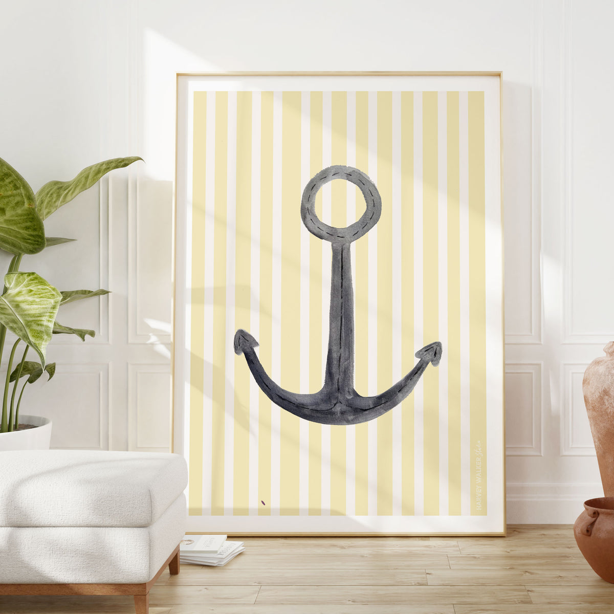 Large framed artwork for mid century and modern coastal homes. Bring a pop of colour to your home with this striking nautical print. In yellow and white stripes with dark contrasting anchor. Hand illustrated watercolours.