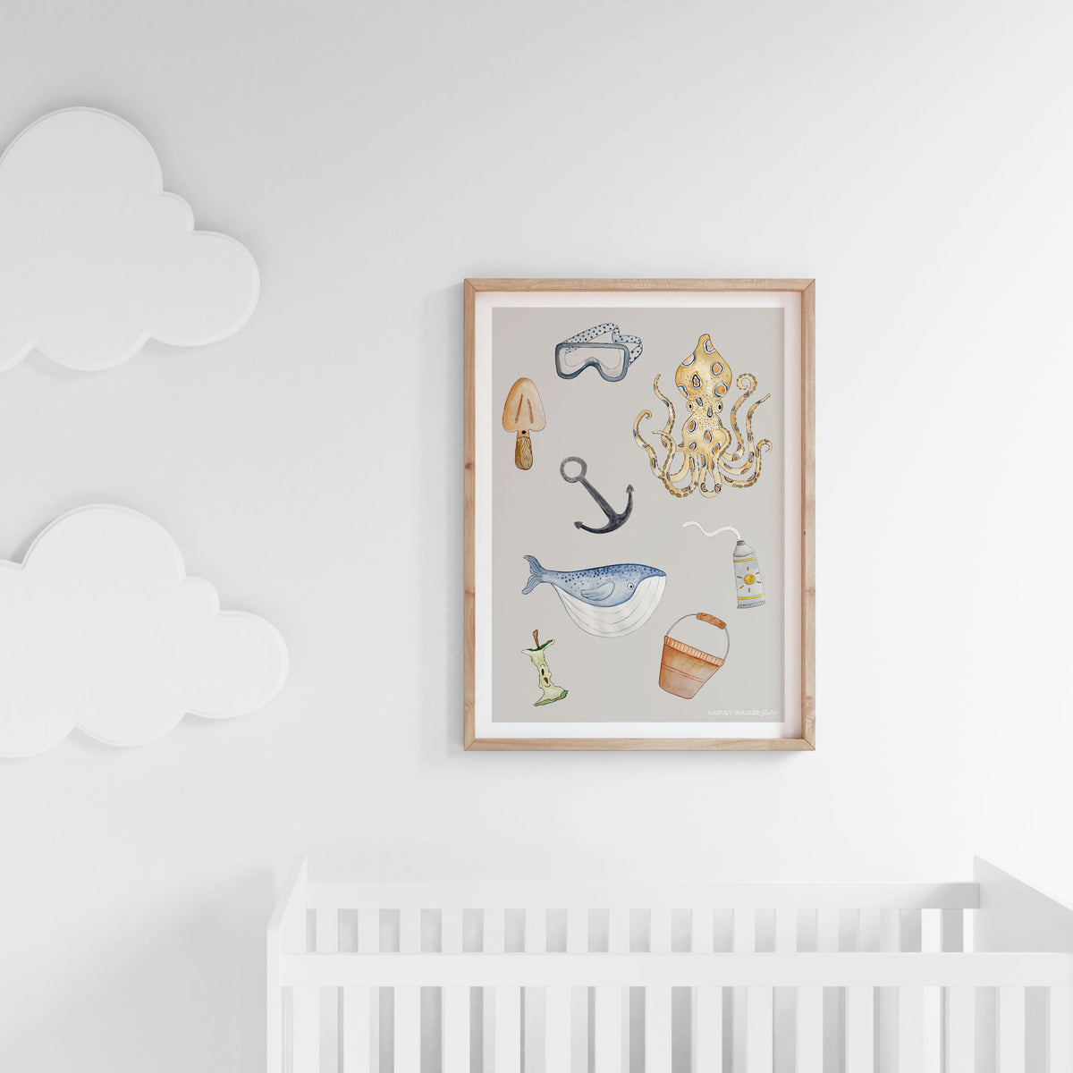Baby artwork, with the beach discovery print hanging above the white cot. Framed in oak, this A1 print is a beautiful addition to any newborns room. Great for gender neutral rooms.