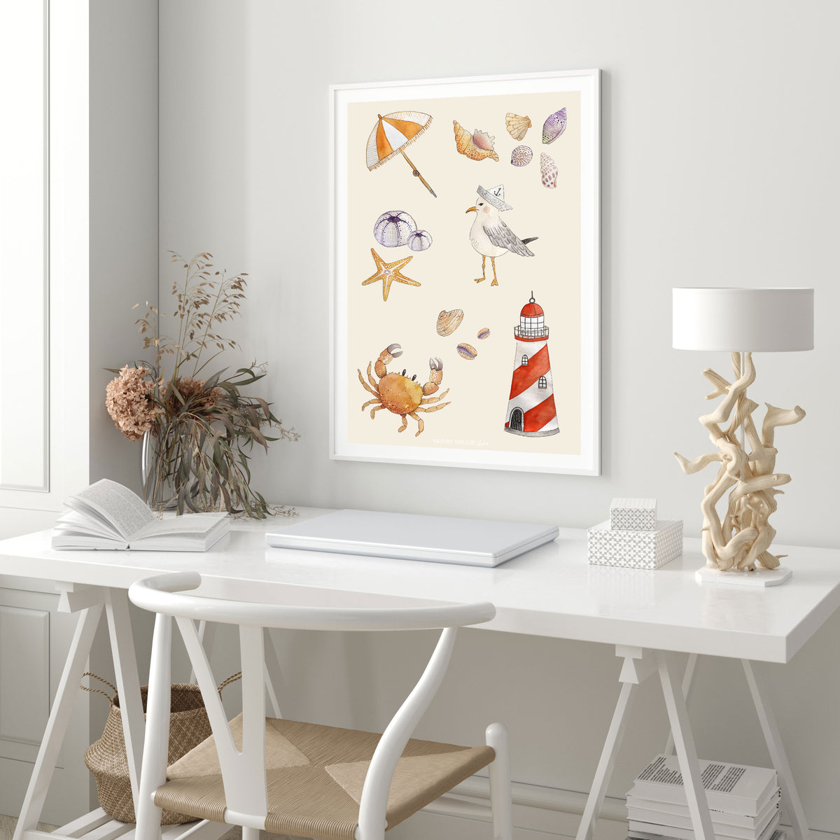 Modern coastal office print. Warm tones of beige and orange. The crab will bring your office to life and the lighthouse will bring a timeless quality. Shown here with a white desk, designer office chair and driftwood lamp.