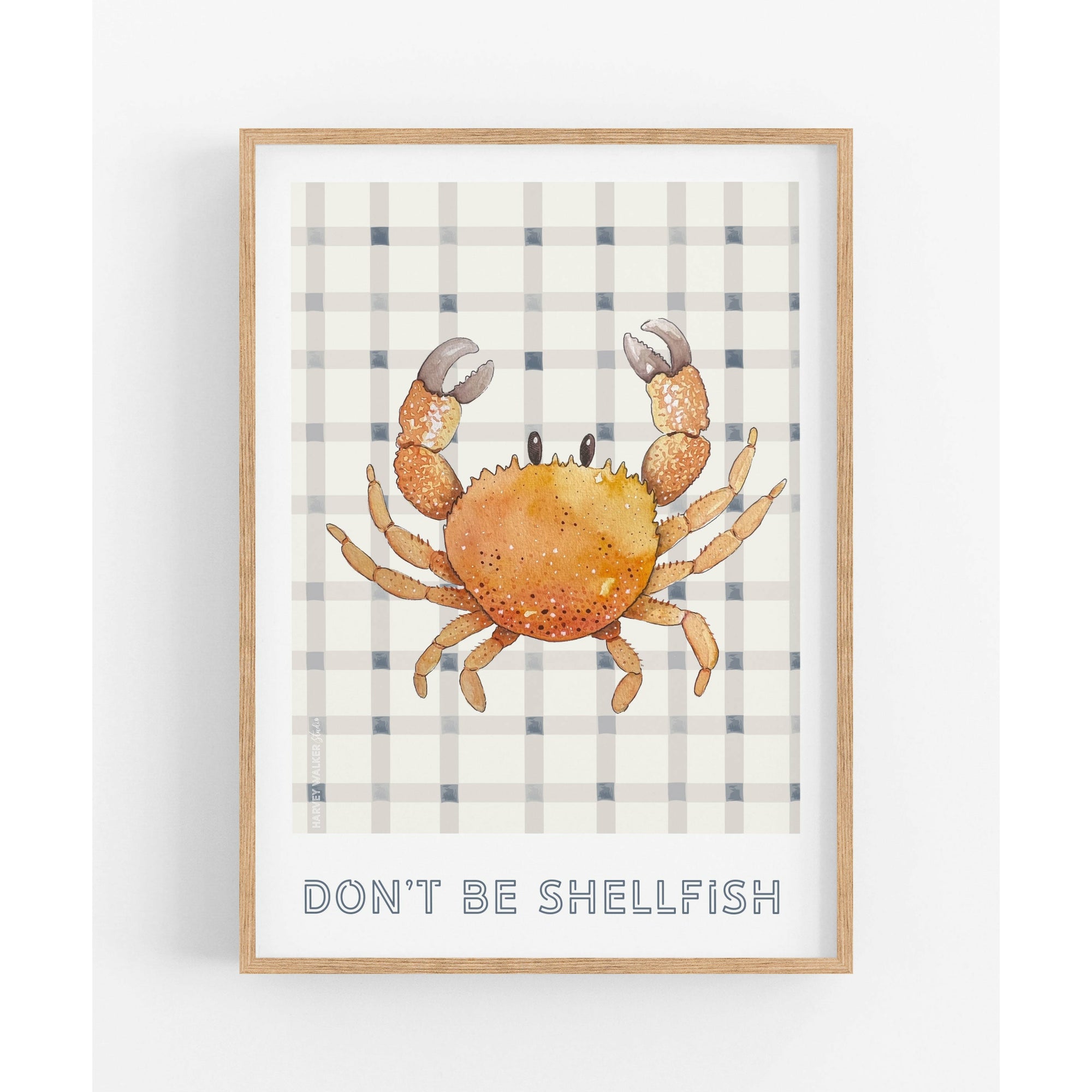 Crab illustration on textured cotton rag paper. Hand illustrated image of shellfish, with a kids quote of " dont be shellfish' is a great addition to any classic hamptons house or modern coastal home. The gingham has soft being and light navy colours, the crab is orange and warm grey.